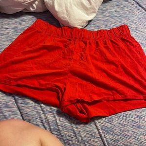 red shorts
